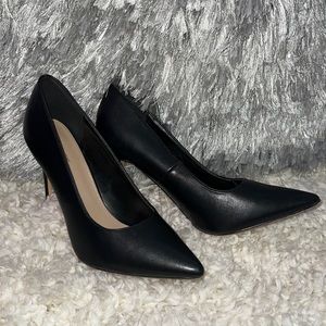PRETTY LITTLE THING black stiletto pumps.
